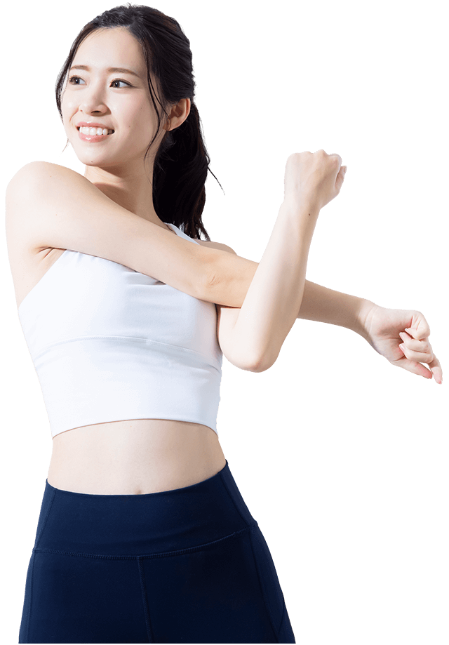 女性が立ちながらストレッチしてる画像